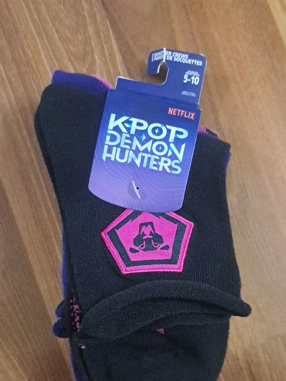 Netflix K-Pop Demon Hunters Black Crew Socks with Purple Cuff and Pink Emblem